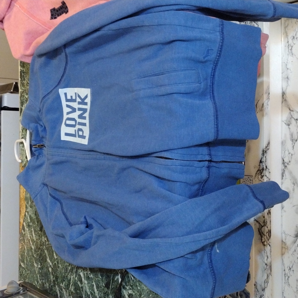 1 blue Pink zip up size med and a pink size medium zip up pink hoodie..